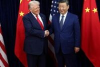 1761802161647-trump-dan-xi-jinping-berjabat-tangan-saat-bertemu-di-busan-korsel-1761793091519_43