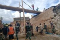 1765019138528-personel-tni-bantu-penanganan-banjir-di-sumut-dok-pendam-ibb-1764756337267_43