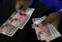 1766768739758-ilustrasi-uang_43